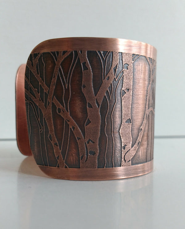 In the Birch Wood patinated wide copper cuff. Patinated copper, fits size small/medium.