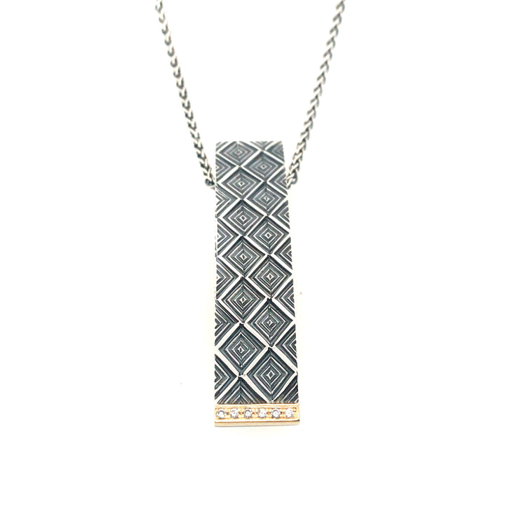 Long rectangular pendant in sterling silver & 18k gold, with diamonds at the bottom, on a 45cm sterling silver chain.