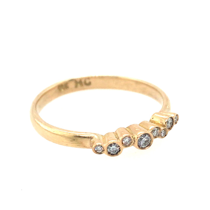 Fine 18k gold band with diamonds. Size 6.75.