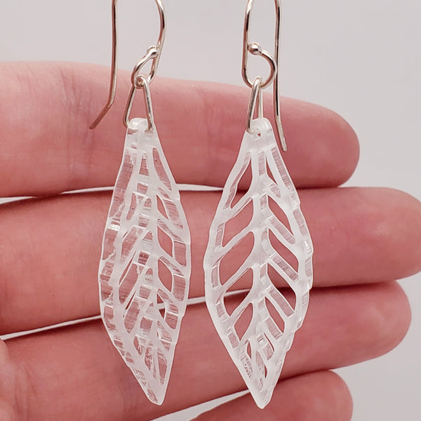Dragonfly and Cicada Wing earrings in clear glassy acrylic.
