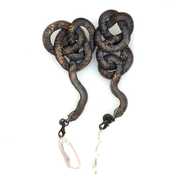Large silver-plated snake chain knot earrings with baroque pearls, surgical steel posts and backs. 