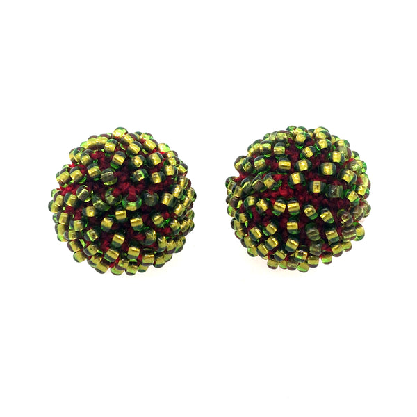 Red and Green Clip-on Earrings with glass beads, and thread.