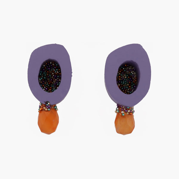 Playful and bright stud earrings, created from painted ovine bone in light violet and carnelian. The earrings are backed with sterling silver and have sterling silver posts.   1.4 x 2.8 x 0.8 cm, 2023