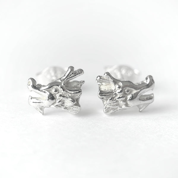 <div><em>Dragon Stud Earrings</em>: mini studs in sterling silver.</div> <div><span>&nbsp;</span></div> <div><span></span></div> <div>7 x 7 x 3 mm</div>
