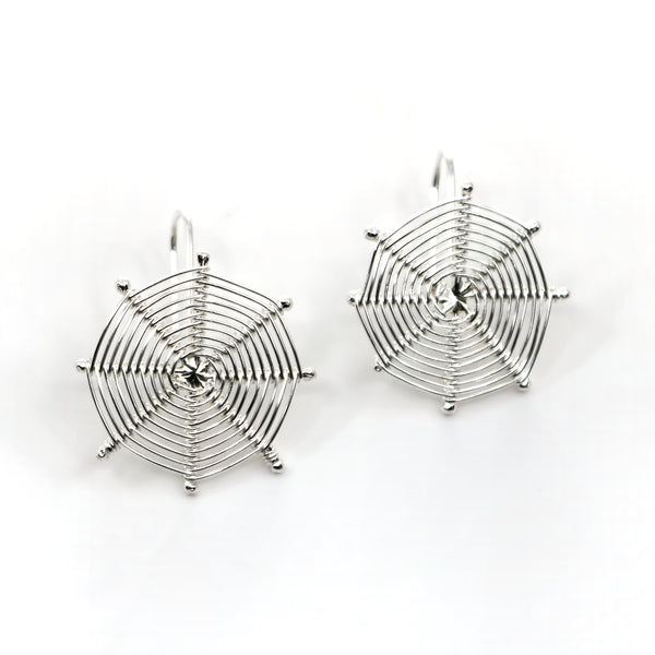 Hanging Webs earrings made from woven sterling silver.