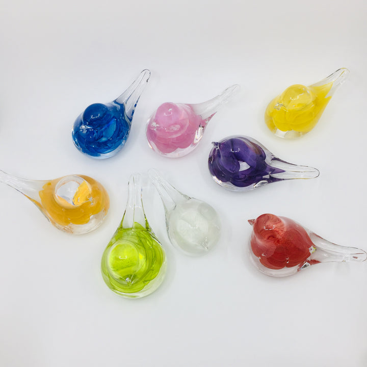 Hand formed glass birds in various colours, for a beautiful table ornament or paperweight. 
