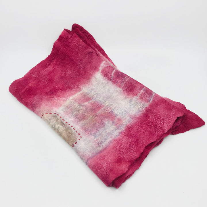 Pink scarf, created with hand-dyed silk and merino wool with recycled materials.