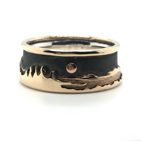 Landscape at night ring with a soft black sky showing beautifully the layers of detail in 14K gold