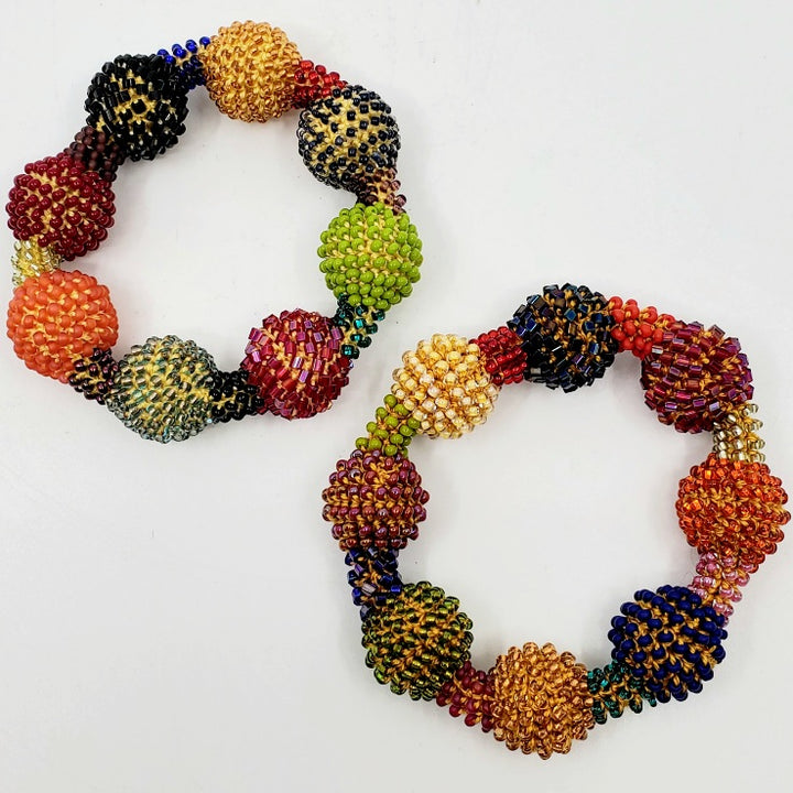 Yael Krakowski Multicoloured Small Ball Bracelet with glass beads and thread.