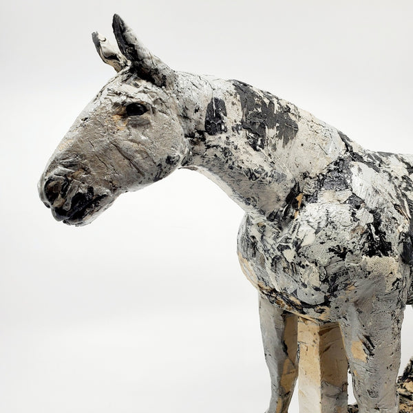 Small Gray Horse 1. This ceramic sculpture with its beautiful dappled texture  achieved with layers of coloured engobes and glazes measures 40 x 10 x 30 cm.