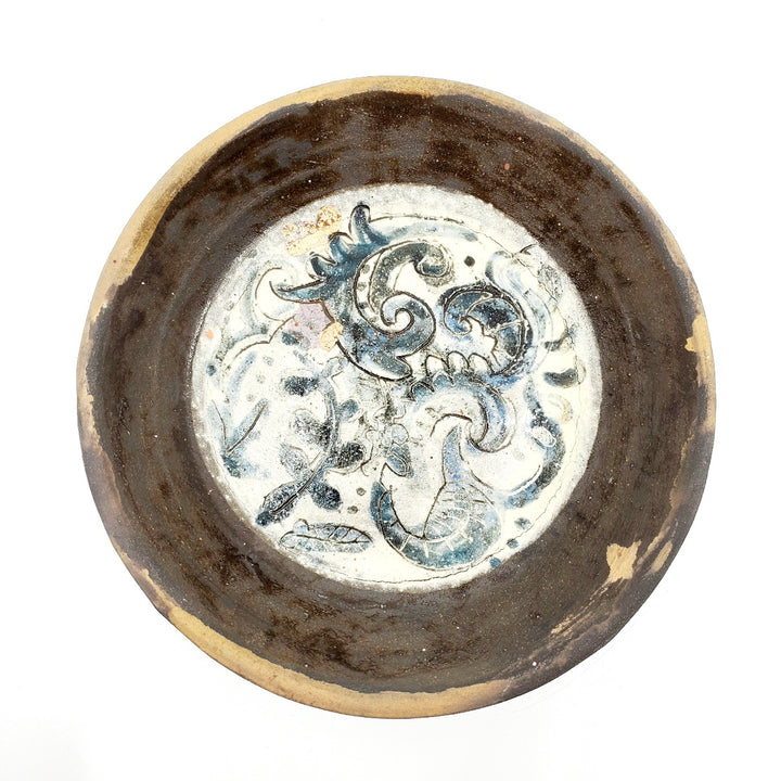 small ceramic plates and dishes: dark floral