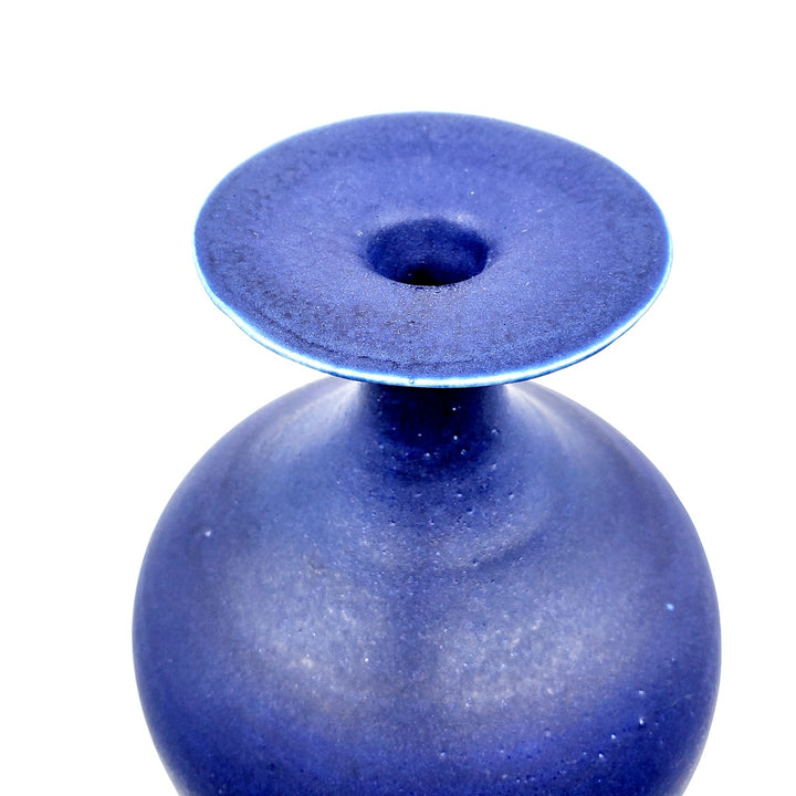 Tall cobalt blue vase.