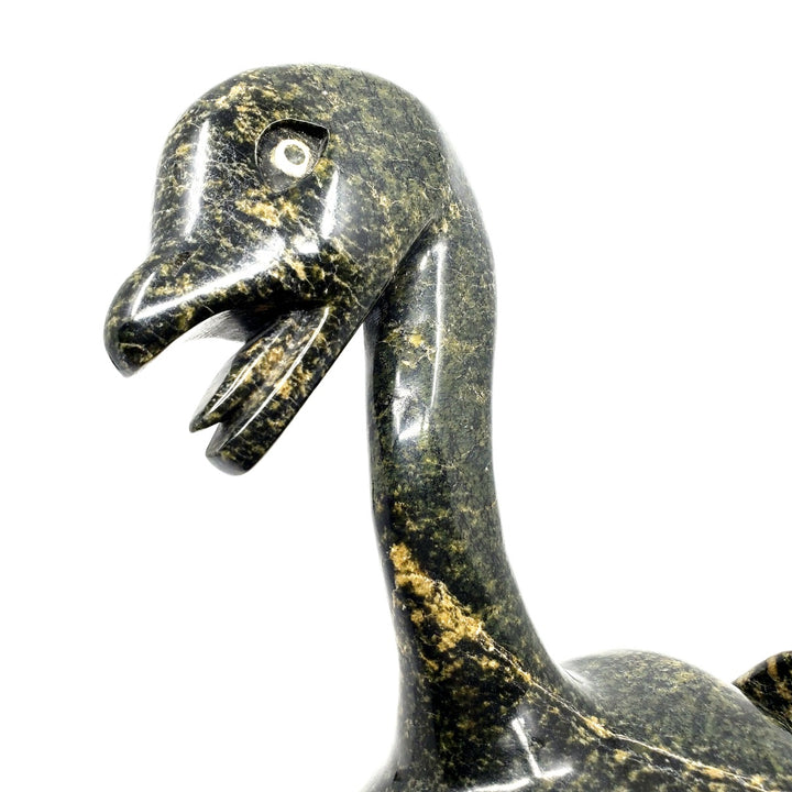 Goose, a large expressive serpentine carving by Toonoo Sharky. 