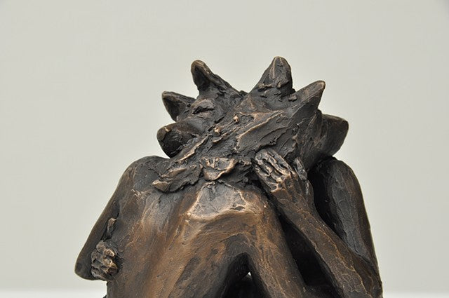 She Wolves in double. Two She Wolves in a face-to-face embrace. Individual cast bronze sculpture, approx. 7" x 4" x 3".