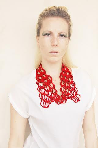 Red necklace in laser cut neoprene by Black Lune.
