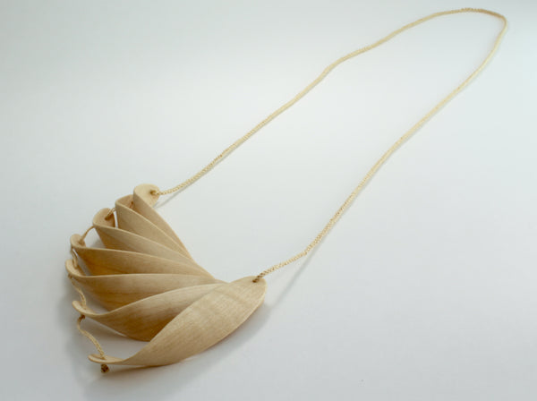 Murmur necklace, 2017. Laminated bent maple wood and cotton.