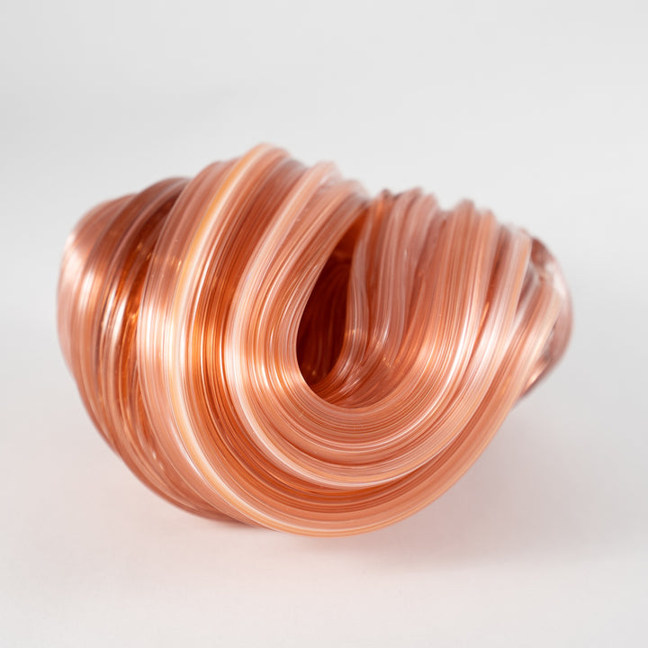Apricot - Glass sculpture. In a large graceful sweep, this one of a kind sculpture measures 12 x 12 x 7 cm. 