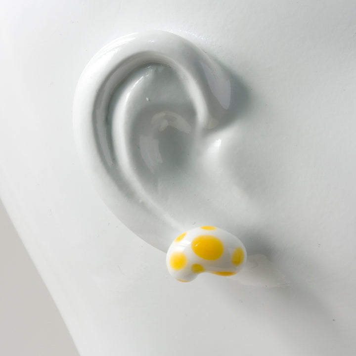 Polka dot Jelly Bean Earrings are available in a variety of delicious flavours. Buttered popcorn