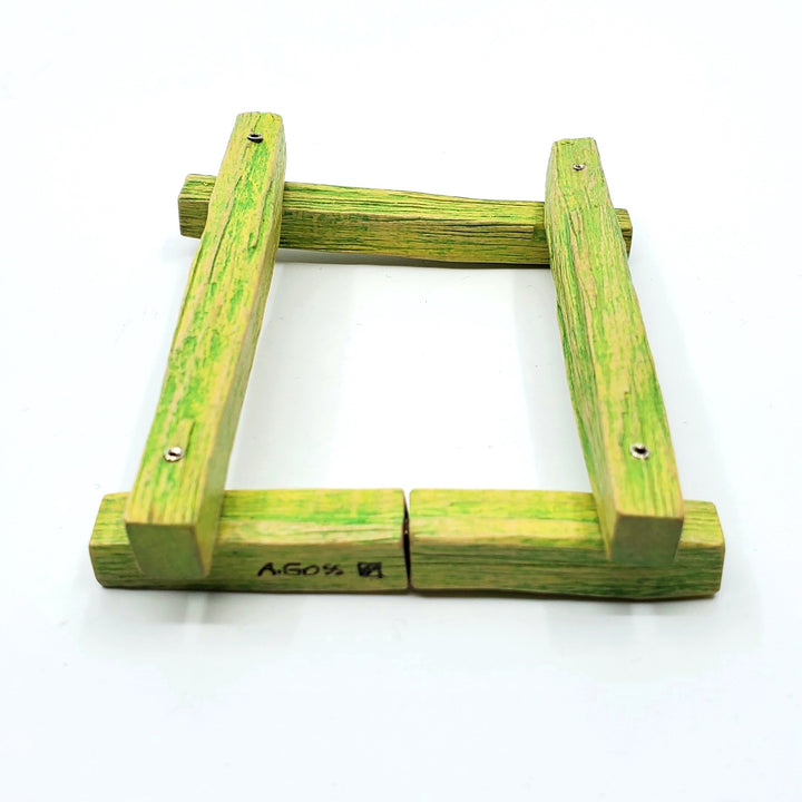 Green Maple Bracelet. Cleverly hinged to allow movement,  this charming wearable sculpture is light on the wrist. 