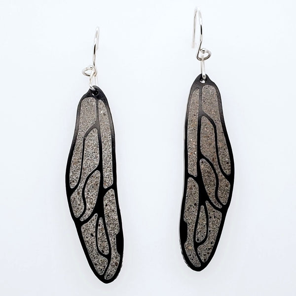 Dragonfly Wing Earrings. Black acrylic veins trace the smooth grey concrete.
