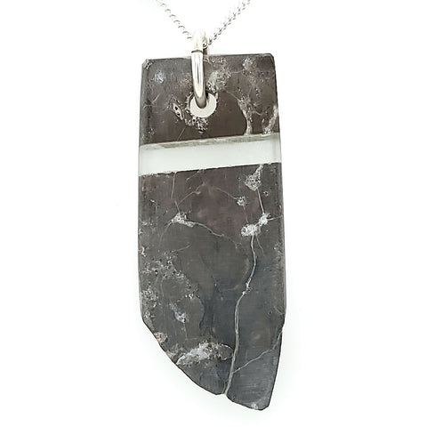 Rock and glass pendant on 24” sterling silver chain.