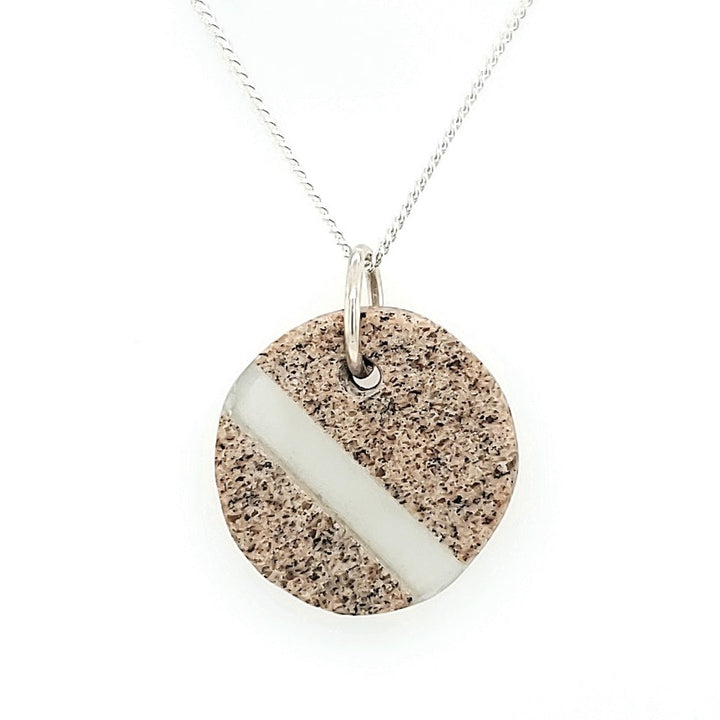 Rock and glass pendant on 18" sterling silver chain.