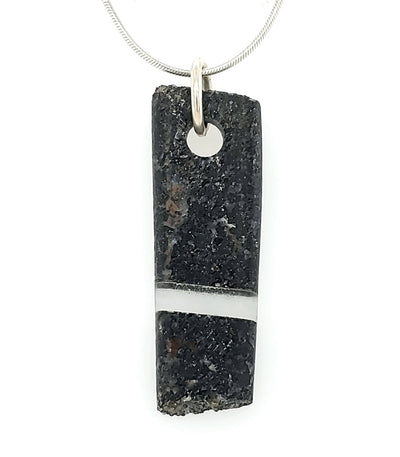 Rock and glass pendant on 18” sterling silver chain.