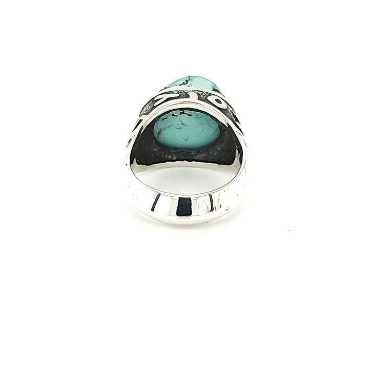 "Chevalière" : Sterling silver runic ring with a turquoise stone. Size 8.