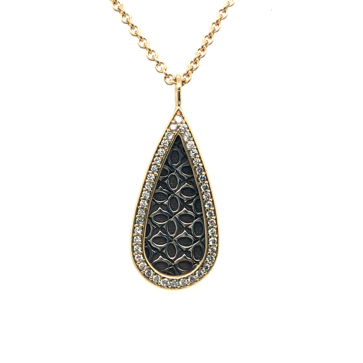Tear drop pendant in sterling silver and 18k gold with diamonds, on an 45cm (18") 18k yellow gold chain.