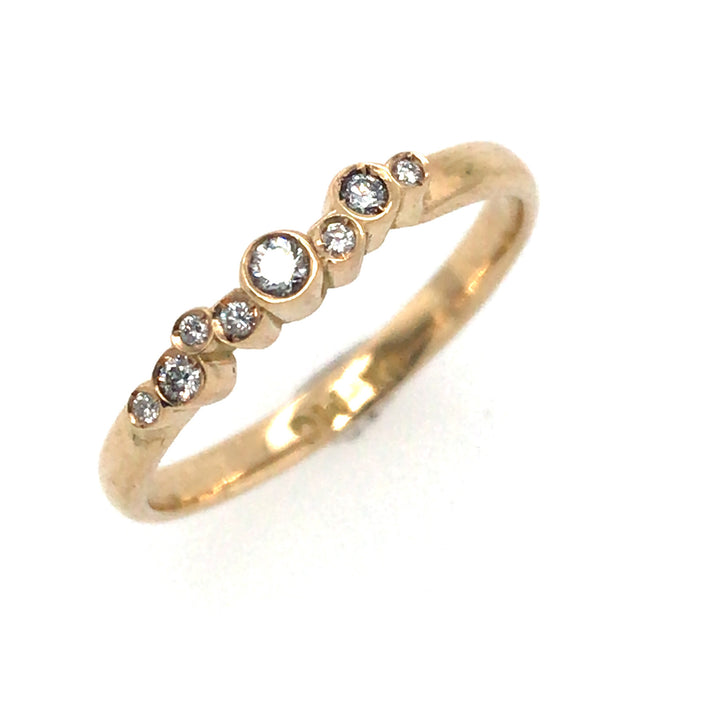 Fine 18k gold band with diamonds. Size 6.75.