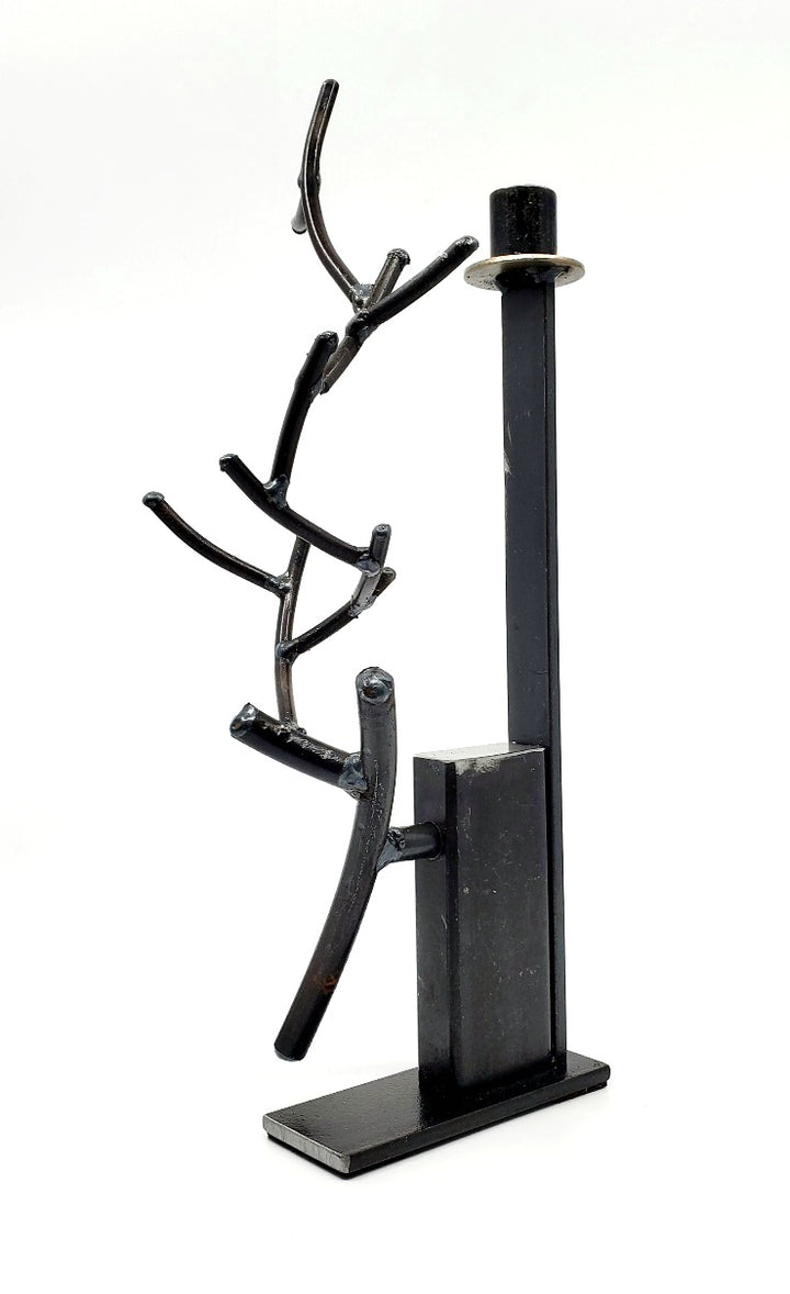 Chandelier, candle holder of found metals from which grows a branch or an antler of welded iron. 7" x 6" x 13.5"