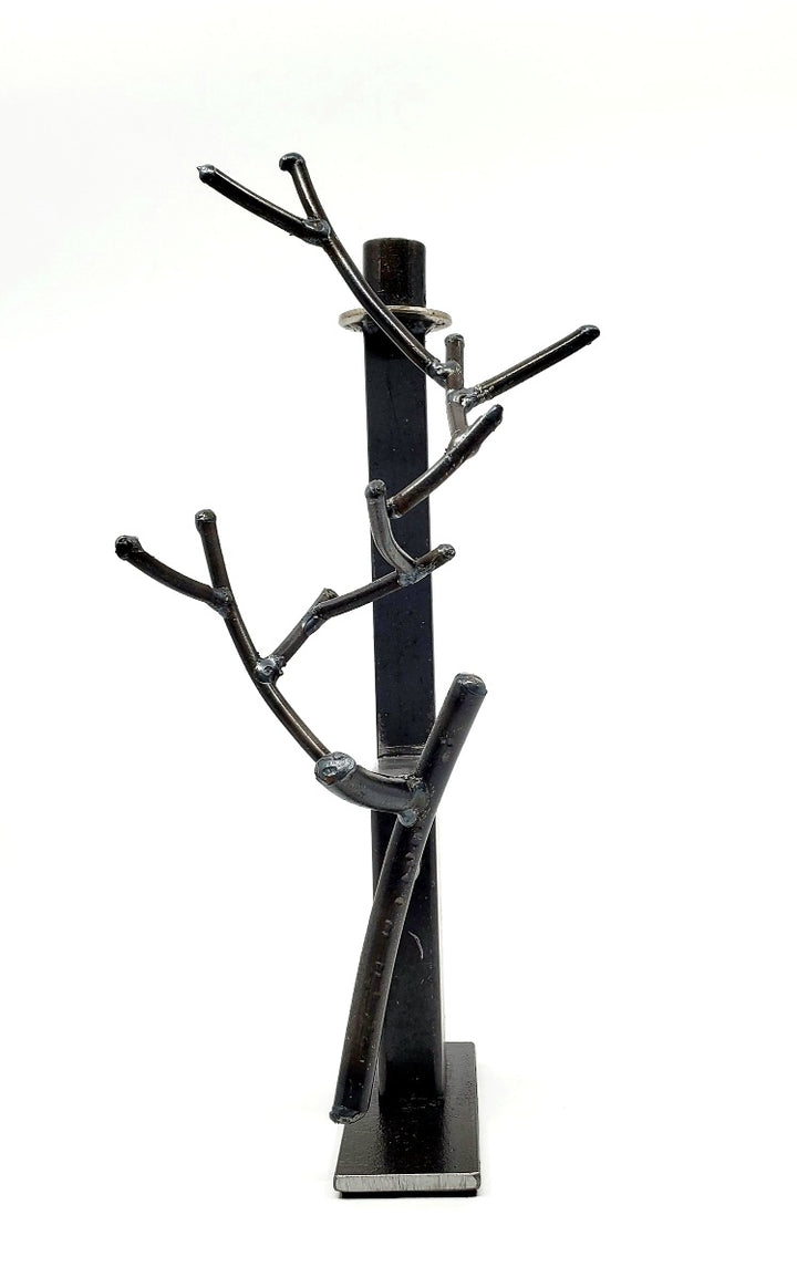 Chandelier, candle holder of found metals from which grows a branch or an antler of welded iron. 7" x 6" x 13.5"