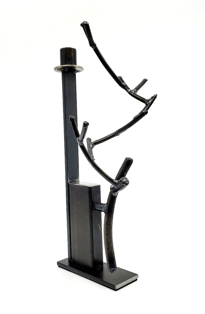 Chandelier, candle holder of found metals from which grows a branch or an antler of welded iron. 7" x 6" x 13.5"