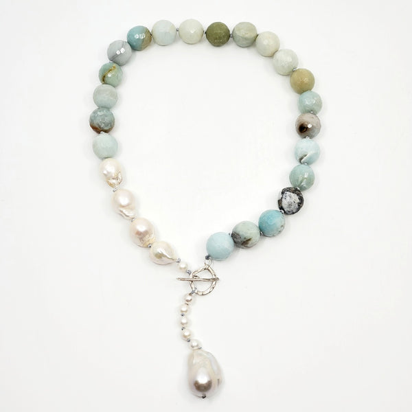 Necklace of amazonite and baroque pearls, hand-knotted between each bead, with a handmade silver clasp. The amazonite beads are 1.5 cm in diameter.