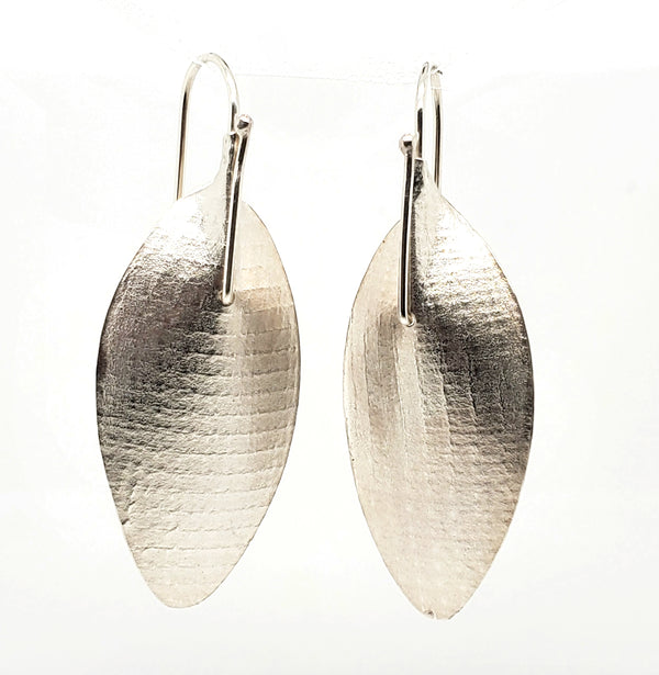 Pinched leaf earrings in textured sterling silver.