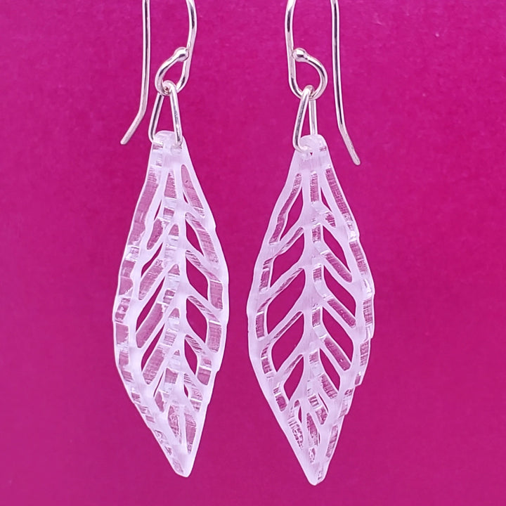 Dragonfly and Cicada Wing earrings in clear glassy acrylic.