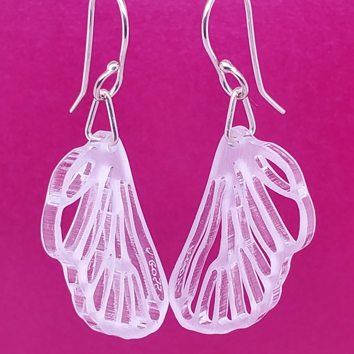 Dragonfly and Cicada Wing earrings in clear glassy acrylic.