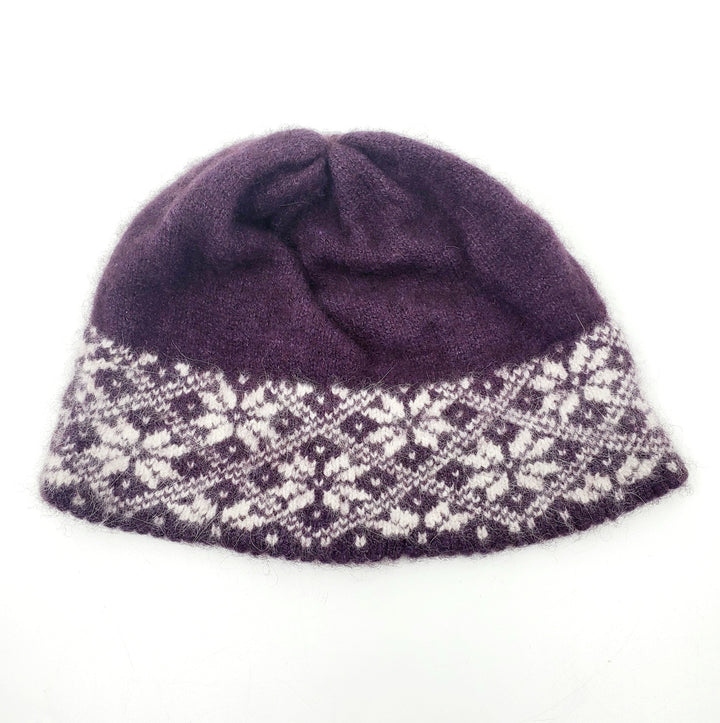 Plum Nunavut Hat made from 60% Qiviut (ox underbelly fur) and 30% Arctic Fox fur with superfine merino and silk. 