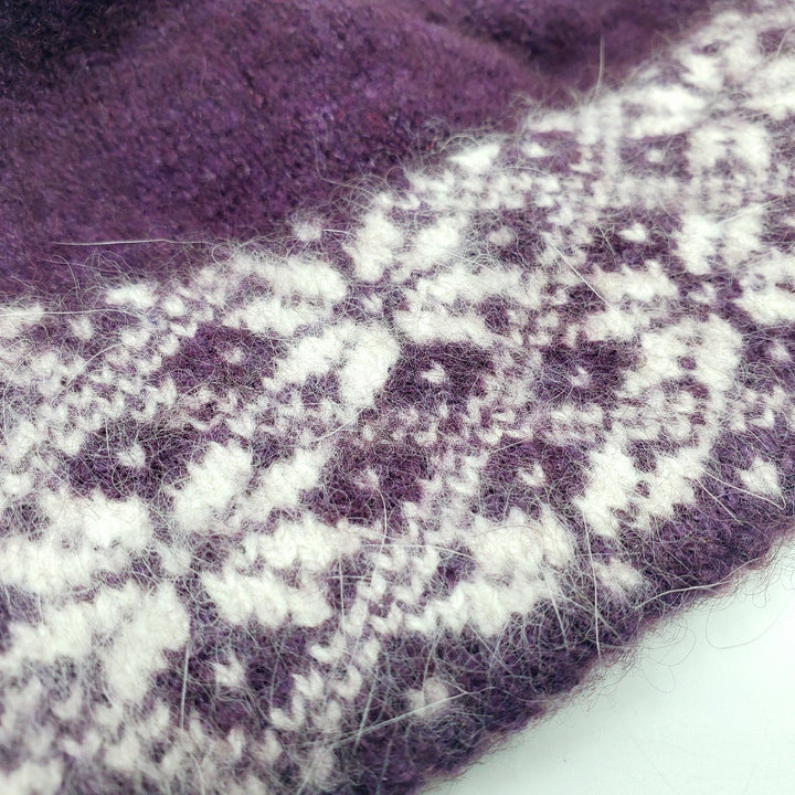Plum Nunavut Hat made from 60% Qiviut (ox underbelly fur) and 30% Arctic Fox fur with superfine merino and silk. 