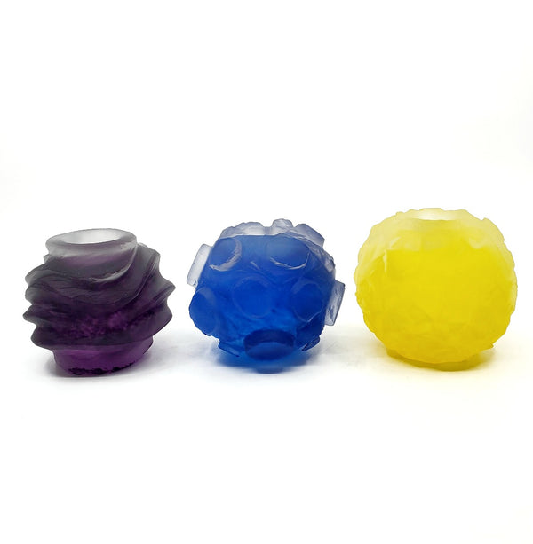 Small round glass candle holders in an assortment of vibrant and refreshing colours.  Turn them over... and use them as a small vase or pencil holder! Each sold separately.