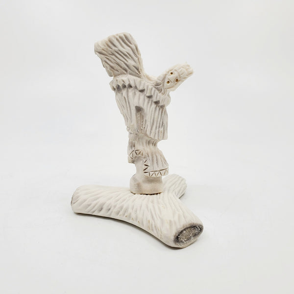 Mother And Baby, caribou antler carving by artist David Nibgoarsi of Arviat, Nunavut. 