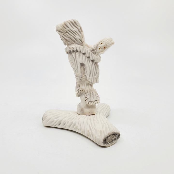 Mother And Baby, caribou antler carving by artist David Nibgoarsi of Arviat, Nunavut. 