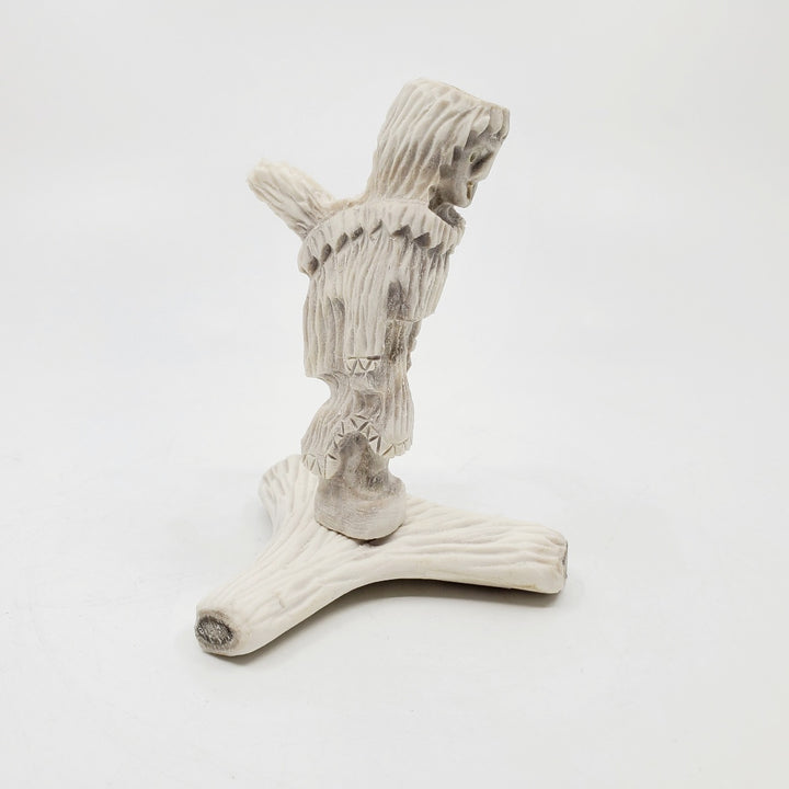 Mother And Baby, caribou antler carving by artist David Nibgoarsi of Arviat, Nunavut. 