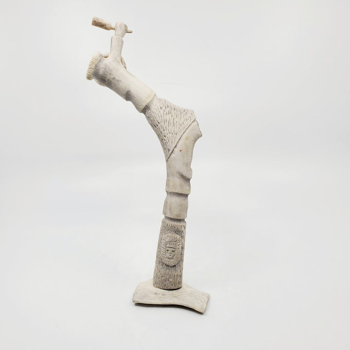 Drum Dancer, caribou antler carving by artist Thomas Nibgoarsi of Arviat, Nunavut.