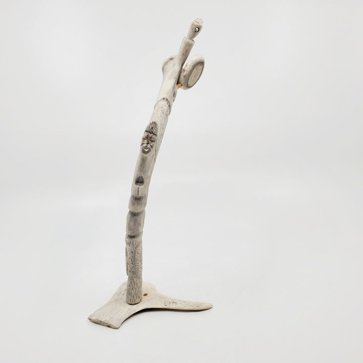 Drum Dancer, caribou antler carving by artist Thomas Nibgoarsi of Arviat, Nunavut.
