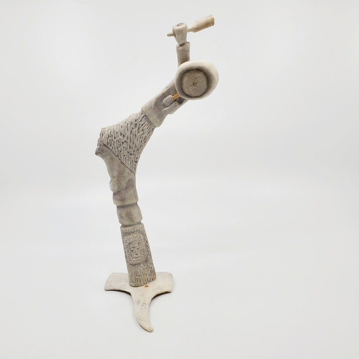 Drum Dancer, caribou antler carving by artist Thomas Nibgoarsi of Arviat, Nunavut.