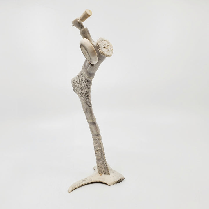 Drum Dancer, caribou antler carving by artist Thomas Nibgoarsi of Arviat, Nunavut.