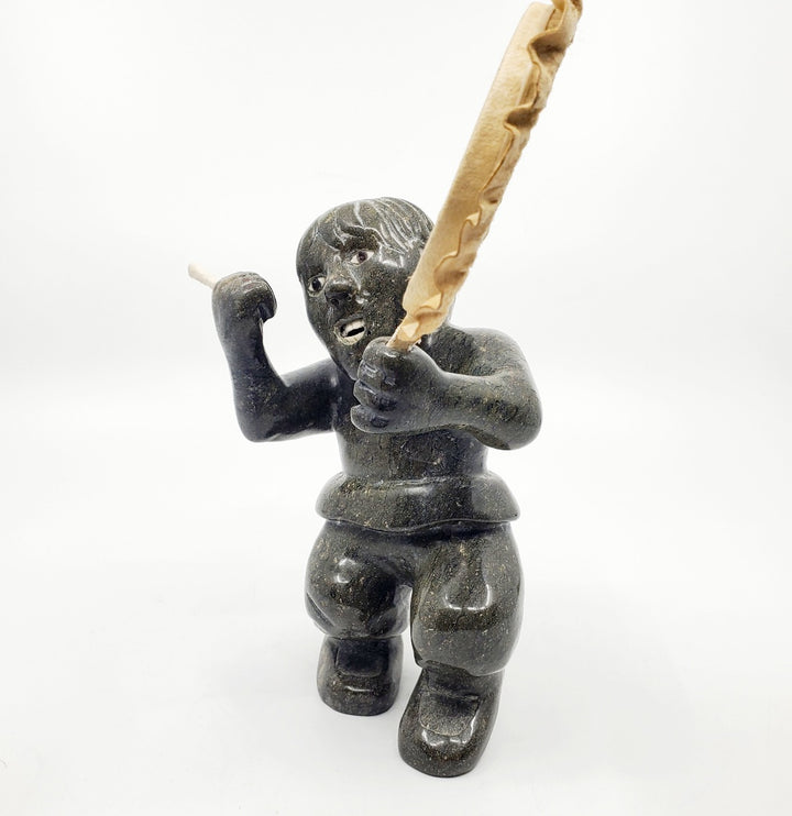 Drummer, serpentinite sculpture by artist Igah Hainnu of Clyde River, Nunavut. 