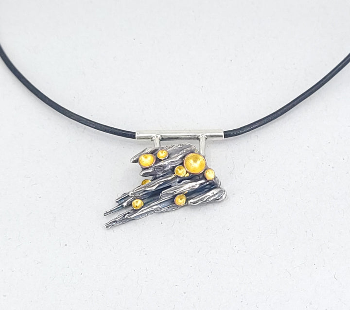 “Forest Floor” Pendant - Sterling silver pendant with 23k gold leaf, copper, and patina.