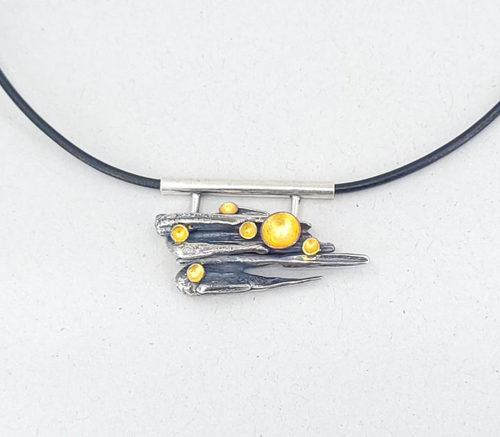 “Forest Floor” Pendant - Sterling silver pendant with 23k gold leaf, copper, and patina.